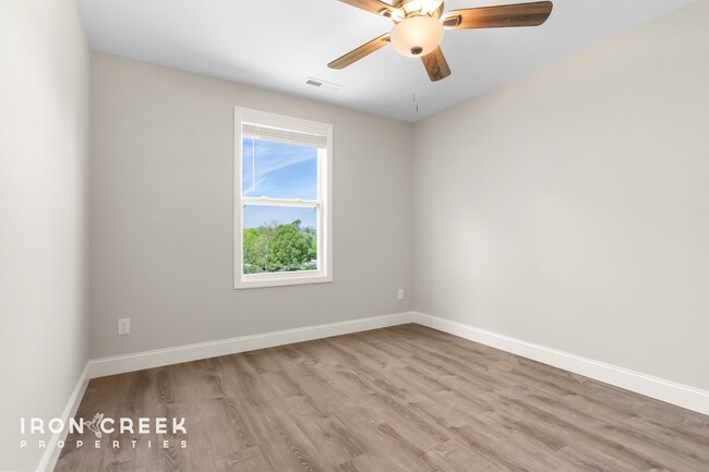 Building Photo - Bright and Modern: New Construction Three-...