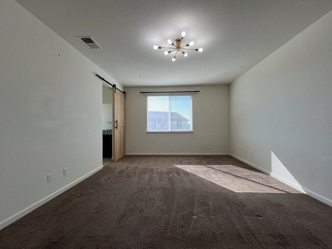 Building Photo - Beautiful 4 Bedroom Home With Low Maintenance Landscaping And Updated Interior