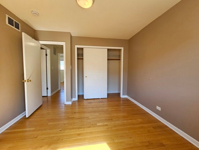 Building Photo - 9924 N Crawford Ave