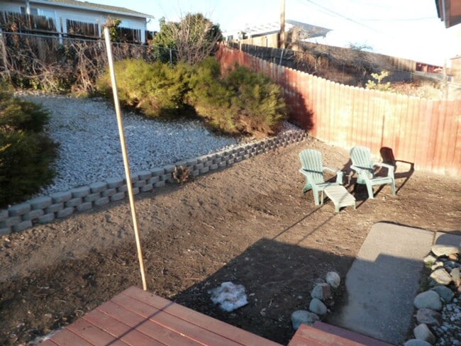 Building Photo - Four Bedroom, Two Bath, Two Car Garage Rem...