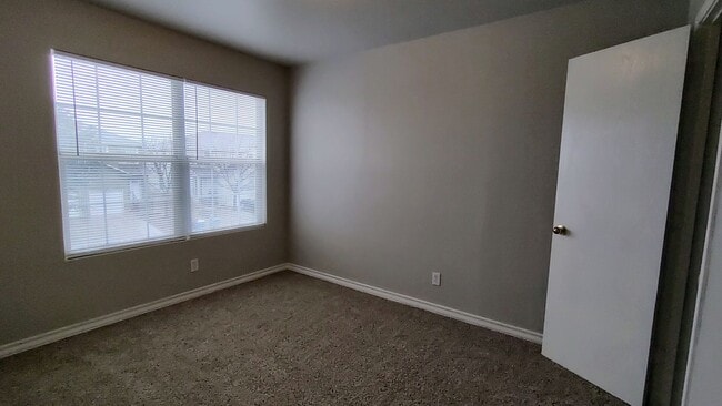 Building Photo - The Gardens at Summit Townhome: 3 Bedroom * 1-car Garage * WD Connections