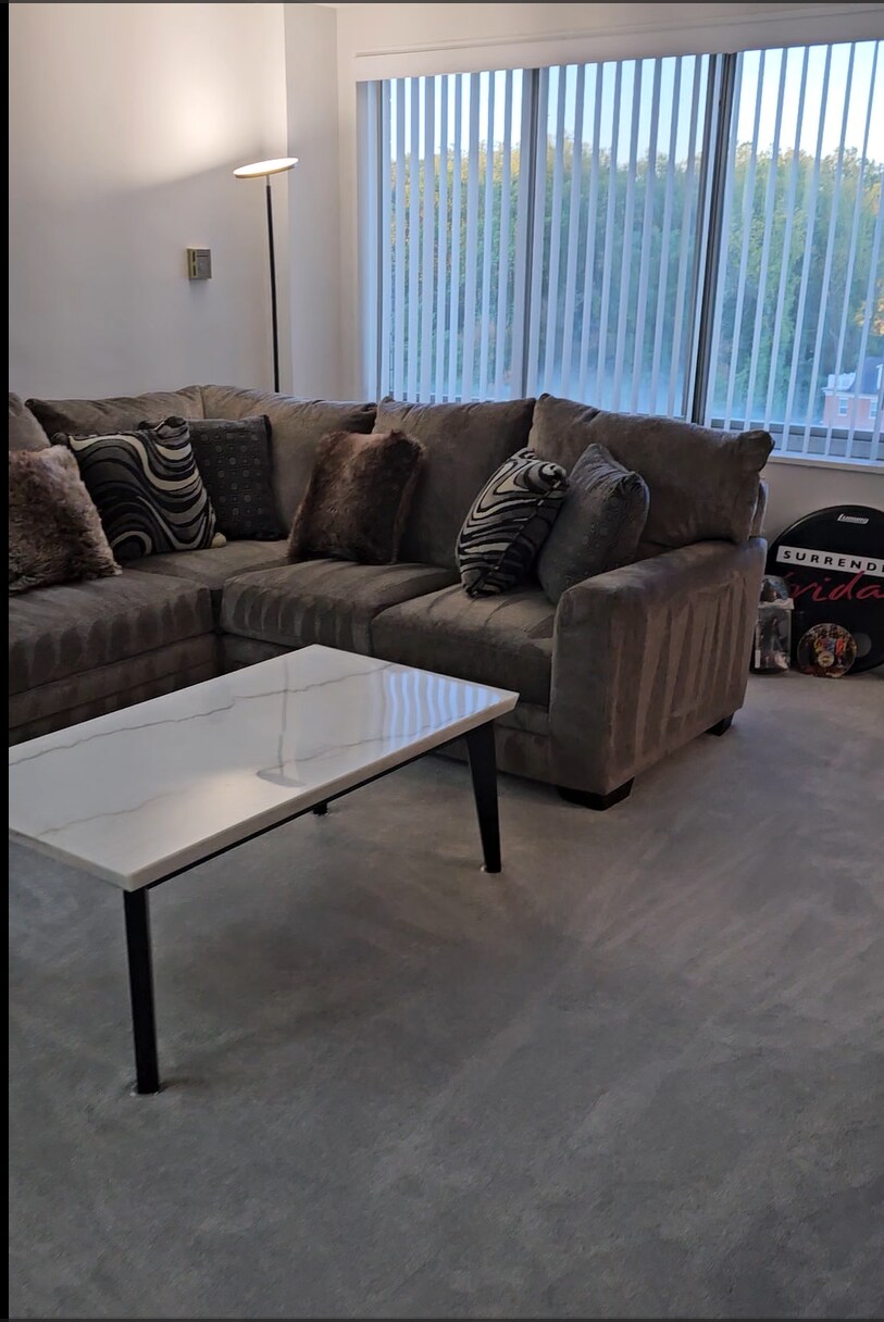 sectional/sleeper couch and coffee table - 10201 Grosvenor Plz