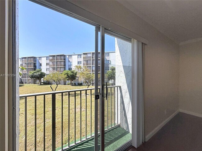 Building Photo - 8740 N Sherman Cir