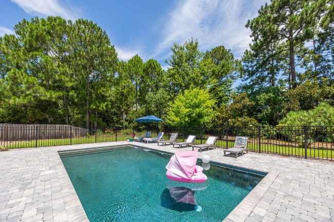 Building Photo - "Coastal Elegance Awaits: Spacious 4-Bed Oasis with $400.00 Off First Full Months Rent!"