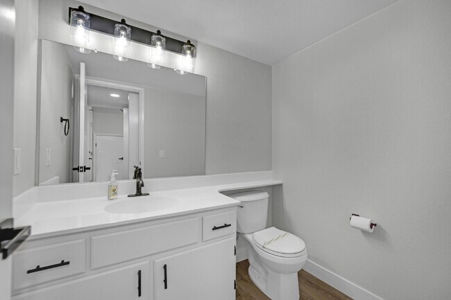 Building Photo - Step into this charming 3-bedroom, 3-bathroom home that has so much to offer!