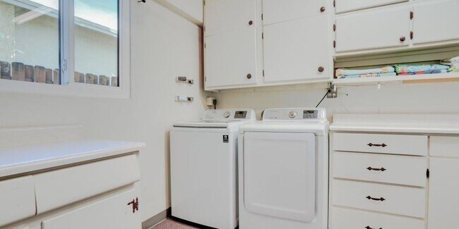 Building Photo - Step Into Sunshine: Modern Charm Meets Coa...