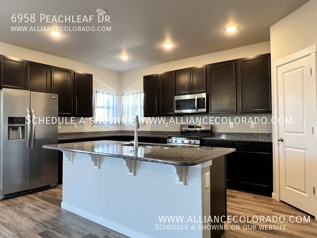 Building Photo - 6958 Peachleaf Dr