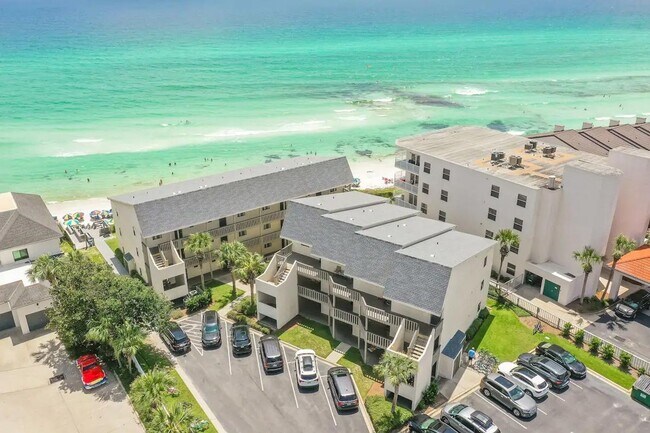 Building Photo - 50% off first months rent.  Gulf front com...