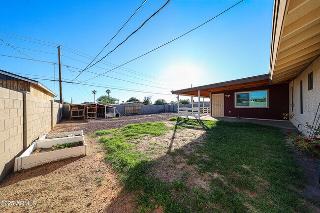 Building Photo - 6539 E Arbor Ave