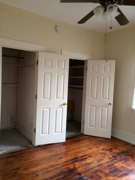 Two closets on south wall of back bedroom - 525 N 1st Ave