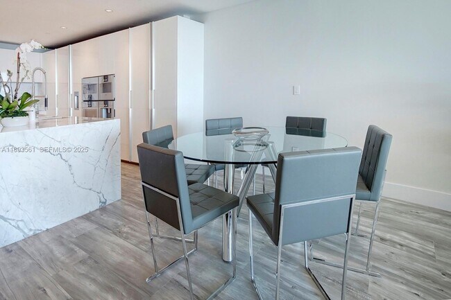 Building Photo - 10203 Collins Ave