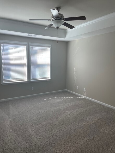 Primary Bedroom with Tray Ceiling - 102 Reese Way