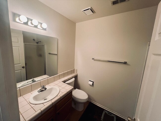 Building Photo - Affordable Comfort in 55+ Guard-Gated Comm...