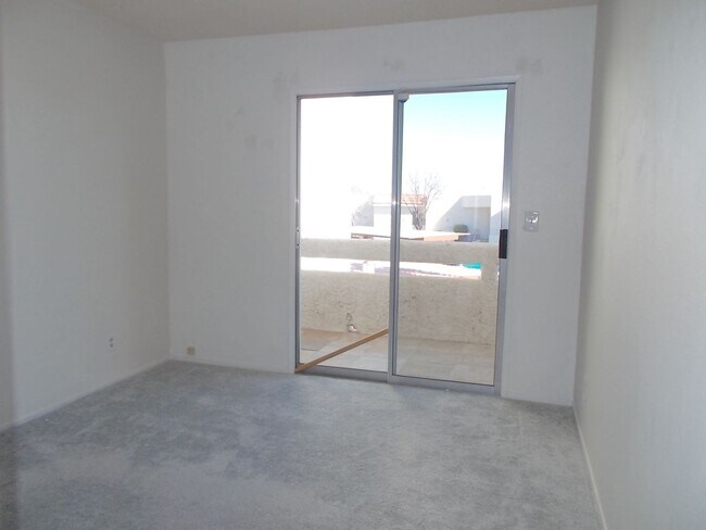 Building Photo - Two-story, 2-bedroom townhome ideally located in the heart of Boulder City