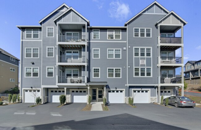 Building Photo - Modern Ground-Level Condo in River Terrace...