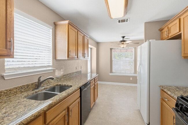 Building Photo - $500 Off One Month's Rent! Beautiful 4 Bedroom Corner Lot Home in Plum Creek