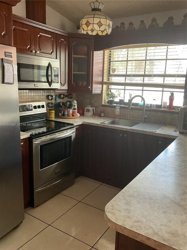 Building Photo - 14345 SW 52nd St