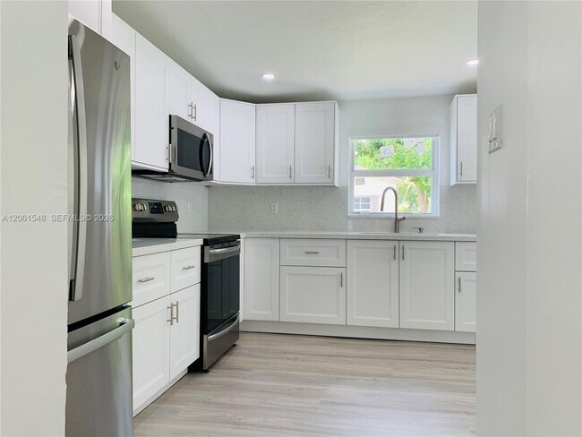 Building Photo - 5441 NW 174th Dr