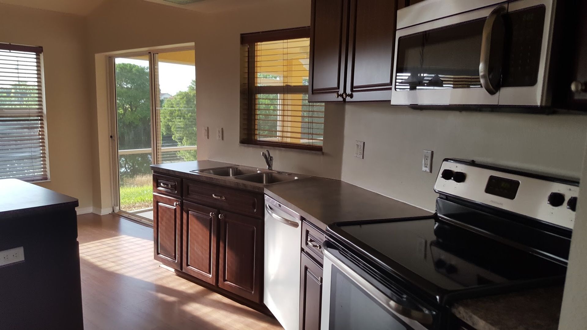 Building Photo - Coming early July ! Gorgeous home overlooking lake