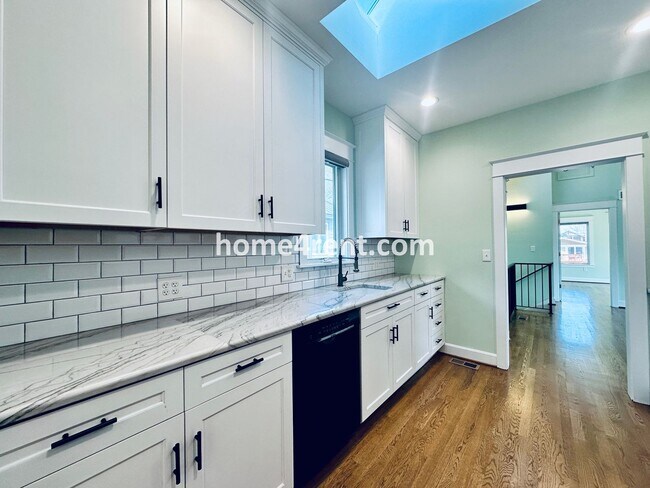 Building Photo - Charming Home Near Country Club Plaza w/ Gorgeous Updates, Wood Floors and a Two Car Garage!