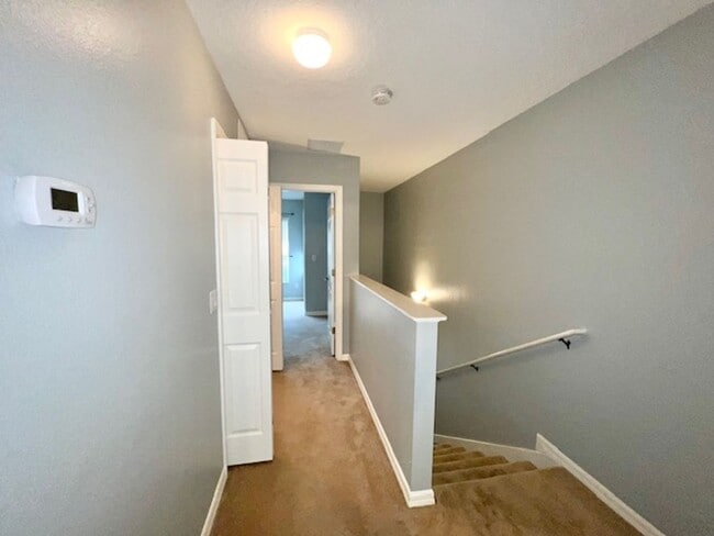 Building Photo - MOVE IN MARCH! Charming 2 Beds 2.5 Bath Townhome! 2 MASTER SUITES! Attached one car garage!! Extr...