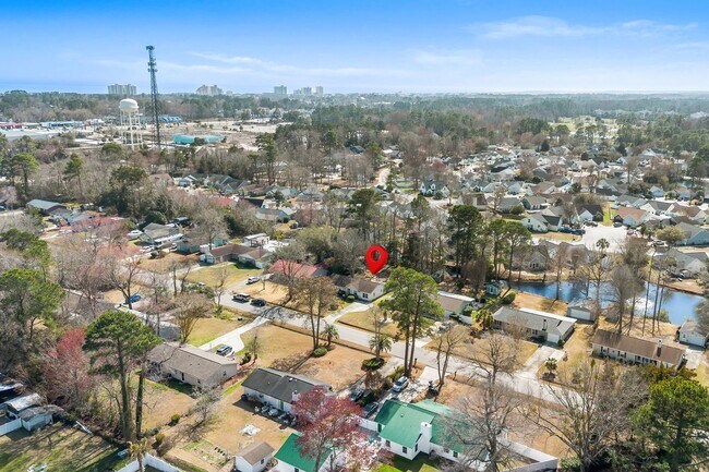 Building Photo - 4 Bed/2 Bath Furnished Single Family Home in Surfside 1 Mile to the Beach By Golf Cart!