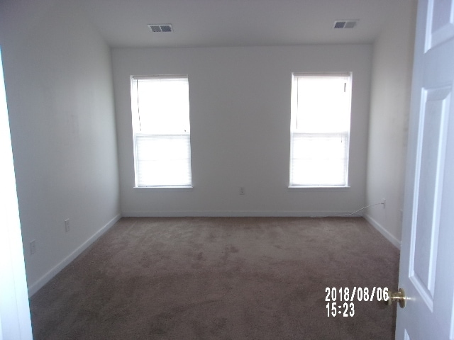 Building Photo - Eastern Henrico Townhome - 3 BR and 2 1/2 ...