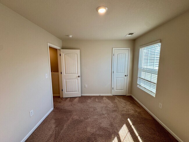 Building Photo - Located in Creedmore Hills a 4BR/2.5BA home with 2 car garage