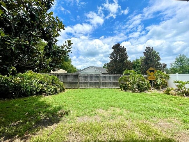 Building Photo - 3/2 ALAFAYA WOODS ADORABLE HOME in OVIEDO!