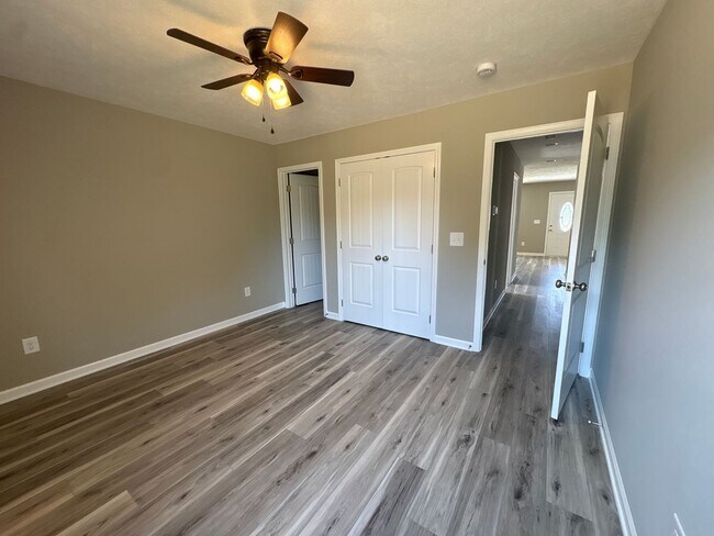 Building Photo - Charming New Home with a Rocking Chair Front Porch!