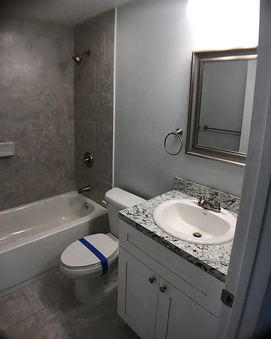 Building Photo - Free 50 inch flat screen TV with every sig...