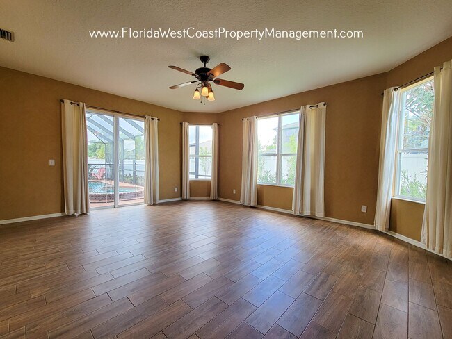 Building Photo - LARGE PARRISH POOL HOME! FENCED YARD! PET FRIENDLY! AVAILABLE FOR JUNE! LONG TERM LEASE!