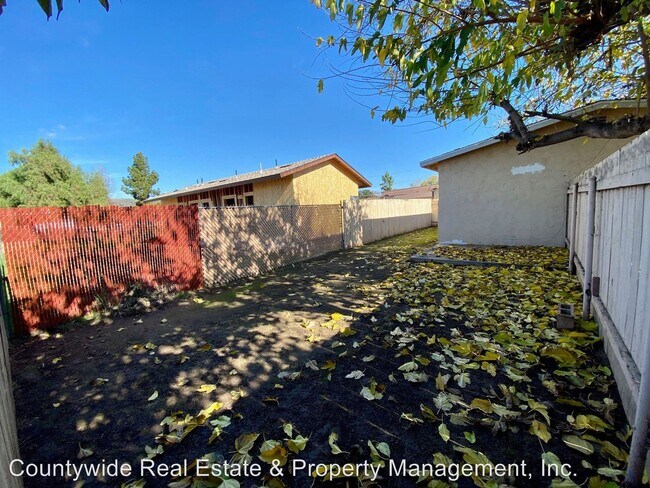 Building Photo - 1100-1154 N Mollison Ave