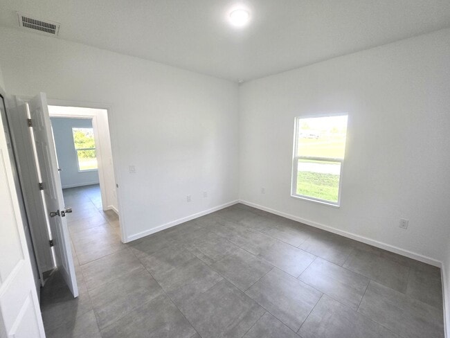 Building Photo - Brand-New 2/2/1 -SW Lehigh Acres-See this one TODAY!