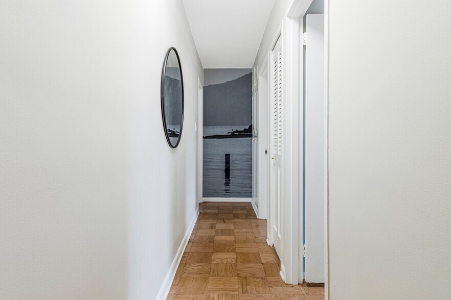 Hallway with linen closet and additional storage - 2939 Van Ness St NW