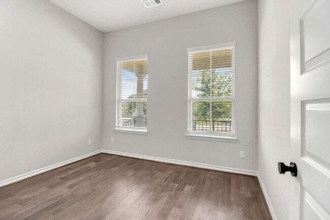 Building Photo - ASK ABOUT FREE APPLICATIONS THROUGH AUGUST!  "Spacious 4-Bedroom Sanctuary with Cozy Fireplace in...