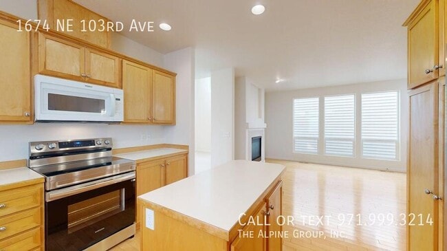Building Photo - 1674 NE 103rd Ave