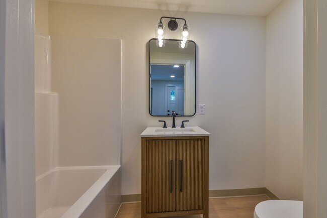 Building Photo - Modern Remodel with Designer Finishes | All Utilities Included