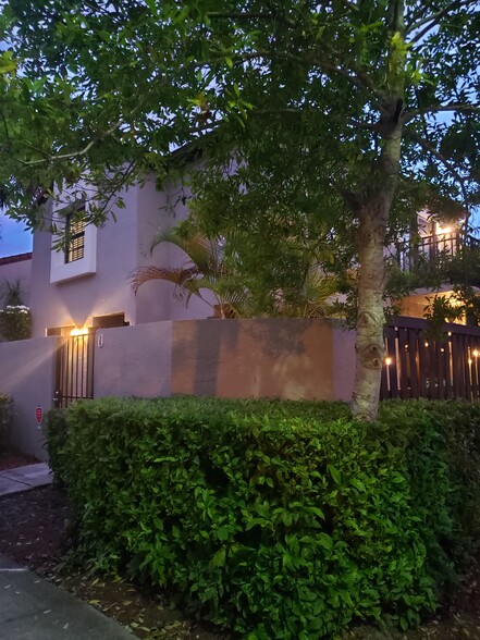 Quiet nice neighborhood view from parking space in front of home - 10425 SW 154th Ct