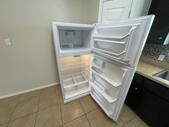 Building Photo - 5402 Marcella Ave