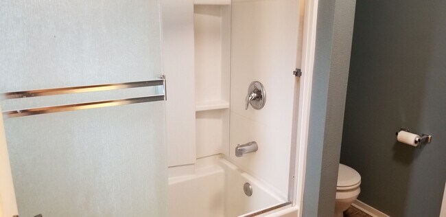 Building Photo - Updated Two Bedroom Condo with Warm Fireplace