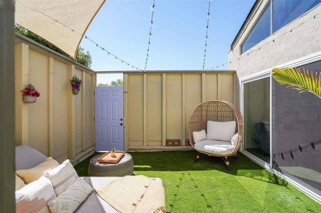 Building Photo - Spacious 1,550 Sq Ft Townhome | 2-Car Garage & High Ceilings w/ Exposed Beams