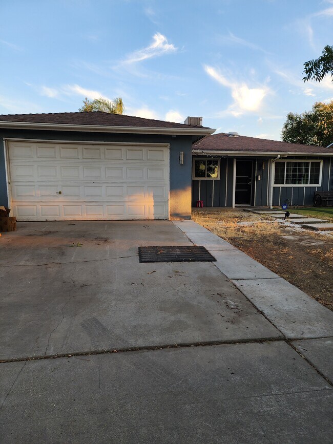 Garage and driveway NOT included - 5962 E Pontiac Way