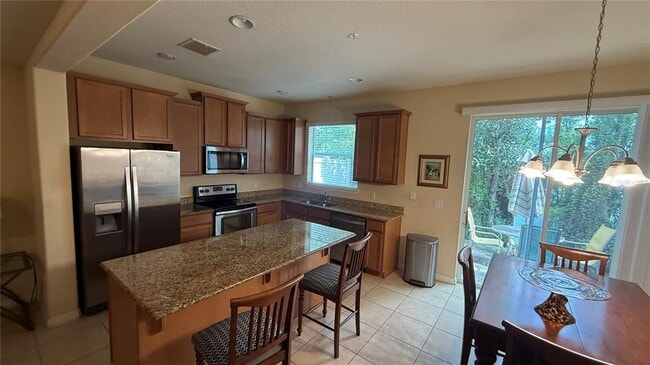 Building Photo - 9339 Cherry Palm Ln