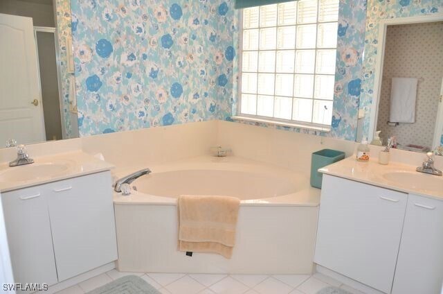 Building Photo - 7040 Pelican Bay Blvd