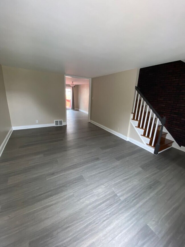 Building Photo - Completely New Row House with Deck Available Now