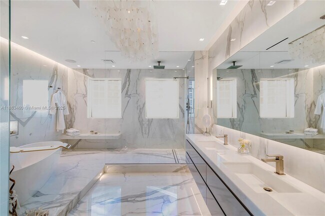 Building Photo - 10295 Collins Ave