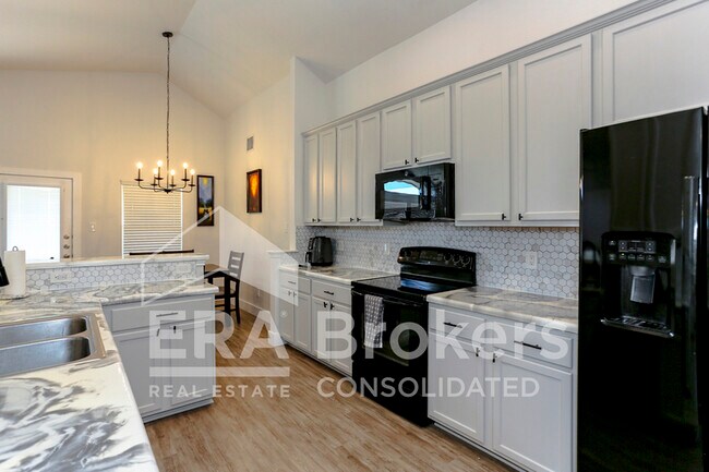 Building Photo - 6110 Melanie Dr
