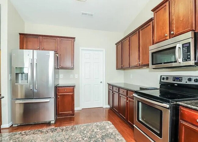 Building Photo - Earn Wealth While Leasing - Like a Homeown...