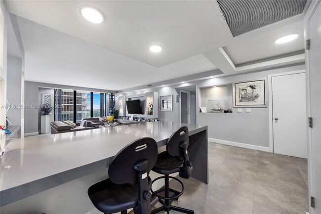 Building Photo - 9801 Collins Ave